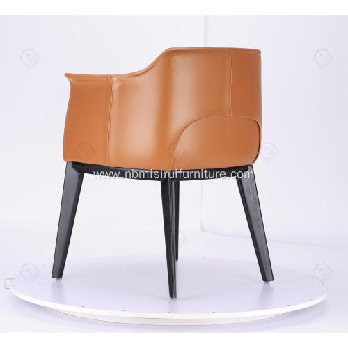 Italian minimalist orange leather single Archibald chairs